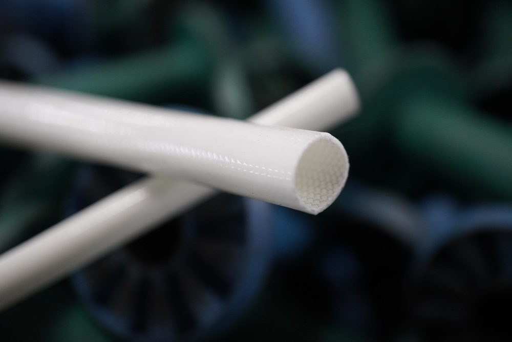 close-up of fiberglass silicone-coated sleeve showing the braided glass fiber core and silicone coating