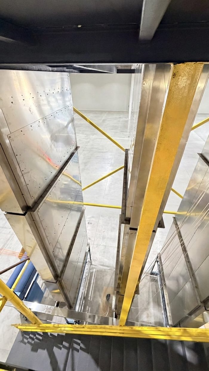 vertical coating and curing tower for fiberglass sleeve production